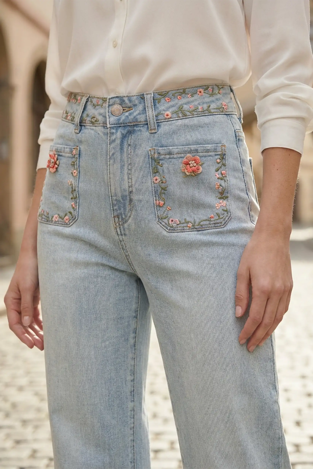 Pantalón vaquero recto azul claro con bordado floral mujer